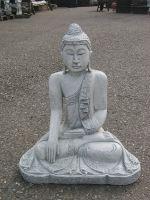 Buddha mit Handbewegung in Richtung Erde, voll Stein