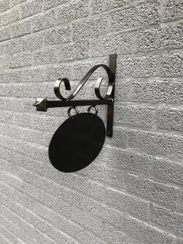 Ladenschild, Werbeschild, Metall, oval, schwarz lackiert