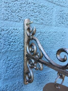 Haus oder Ladenschild, Metallversion mit Seitenarm