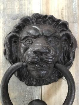 Deurklopper leeuwenkop met stopper, gietijzer, bruin