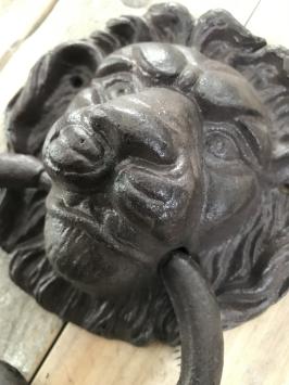 Deurklopper leeuwenkop met stopper, gietijzer, bruin