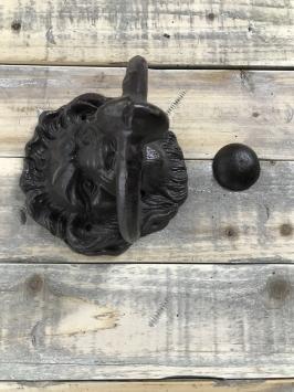 Deurklopper leeuwenkop met stopper, gietijzer, bruin