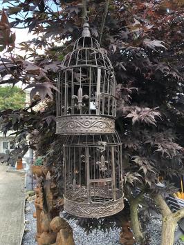 Set ronde bruine metalen vogelkooitjes
